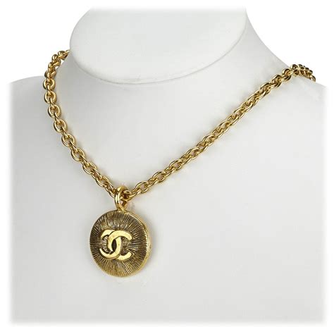 chanel gold charm necklace|Chanel necklace price list.